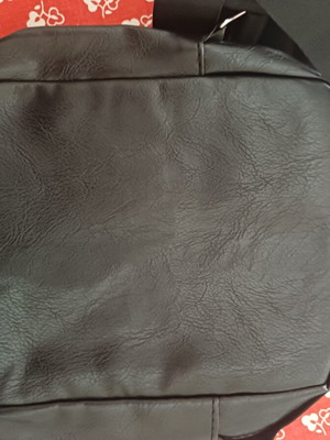 Shoulder bag new, black leatherette with multiple pockets