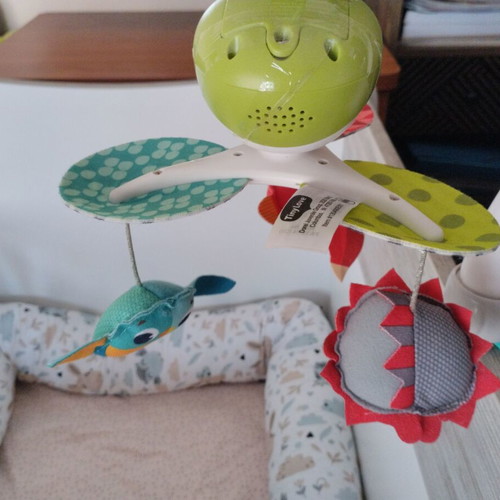 Tiny Love rotating toy used with music and colorful animals