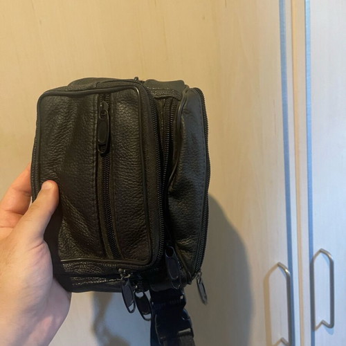 Black waist bag like new with minor zipper defect