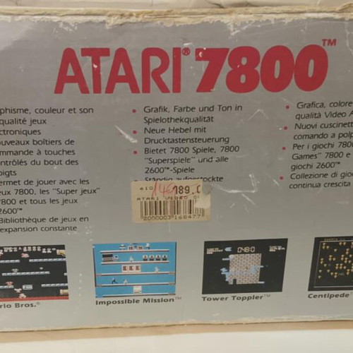 Atari 7800 console used with 2 joysticks and games