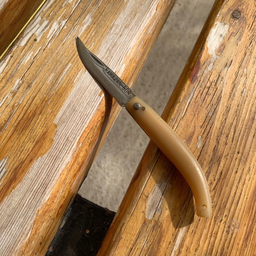 Handmade small folding knife used with engraved name
