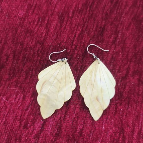 Leaf-shaped earrings used, beige