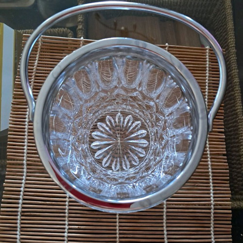 Vintage crystal ice bucket used with stainless steel rim and handle