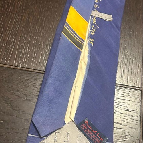 Vintage Personal Line tie like new with ancient designs