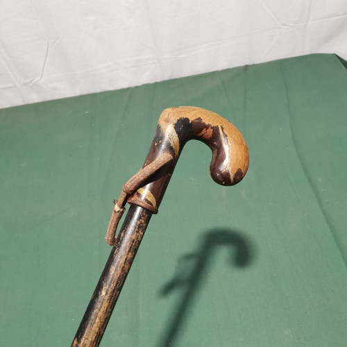 Wooden walking stick used, brown shade with wear