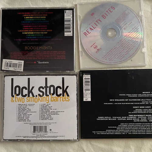 CDs with Boogie Nights, Lock Stock, Reality Bites movie soundtracks like new
