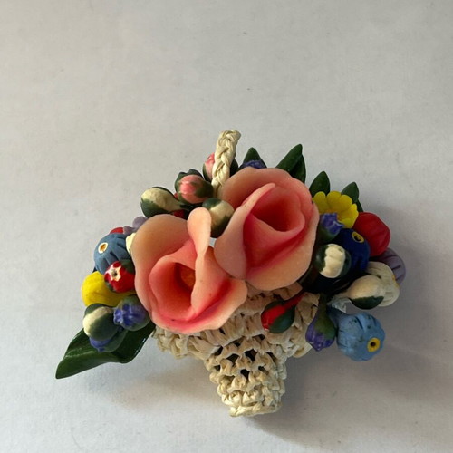 Vintage flower brooch with woven basket and plastic flowers like new