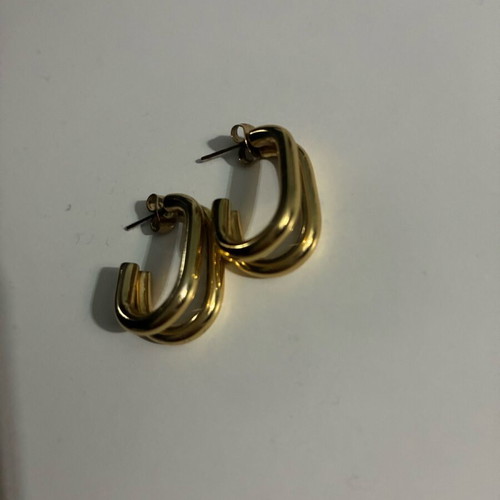Steel hoop earrings in gold color new in box