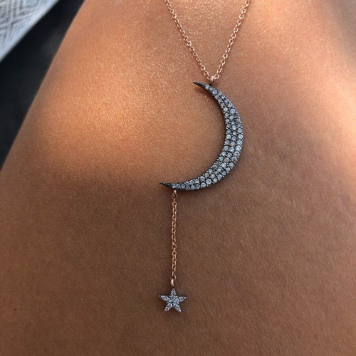 Moon and star necklace like new, pink gold with diamonds