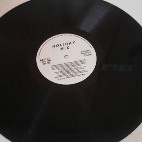 Holiday Mix vinyl records like new, 2 discs