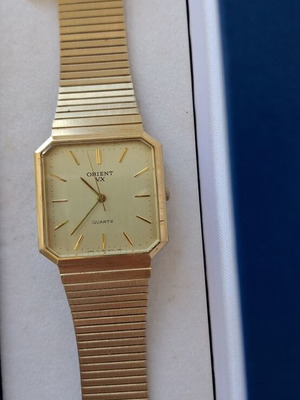 Orient VX Japan Quartz watch like new, beige and gold