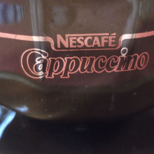 Nescafe Cappuccino porcelain cup and saucer set like new