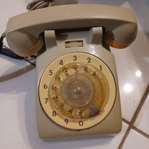 Rotary desk phone from 1981, used, beige