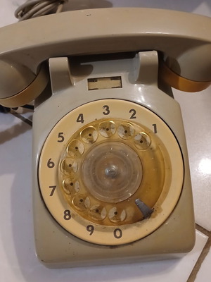 Rotary desk phone from 1981, used, beige