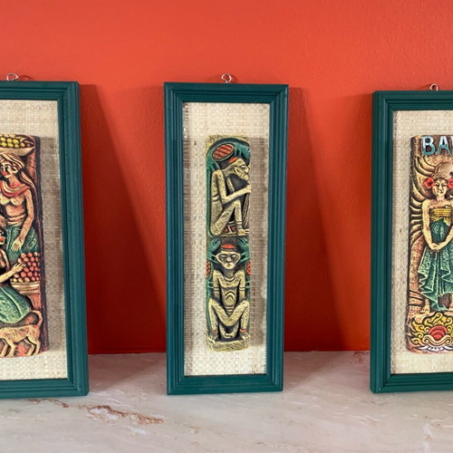 Handmade wooden frames with embossed exotic figures from Bali