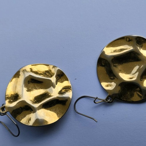 Dangling earrings used, gold-colored