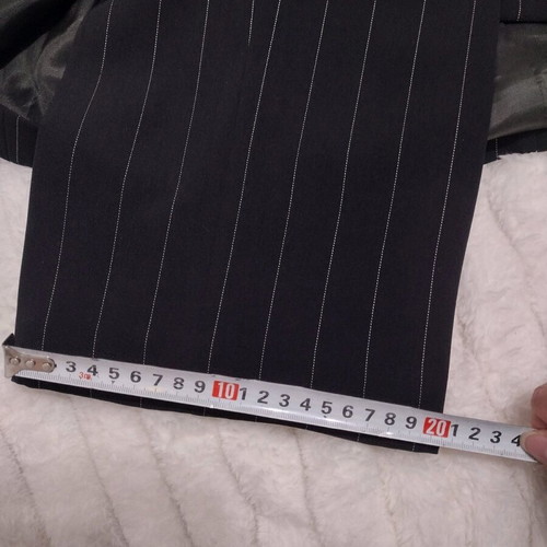 Women's black two-piece suit like new with white pinstripe size M