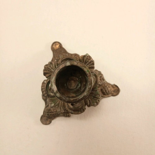 Candlestick old used brass with embossed decorations