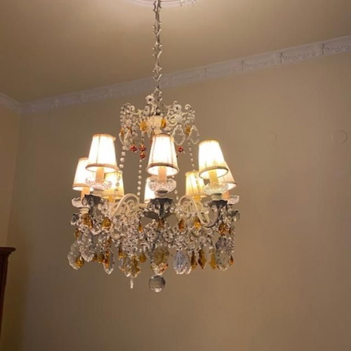 Chandelier like new with crystals and lampshades