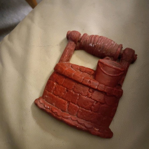 Decorative wall well used, red color