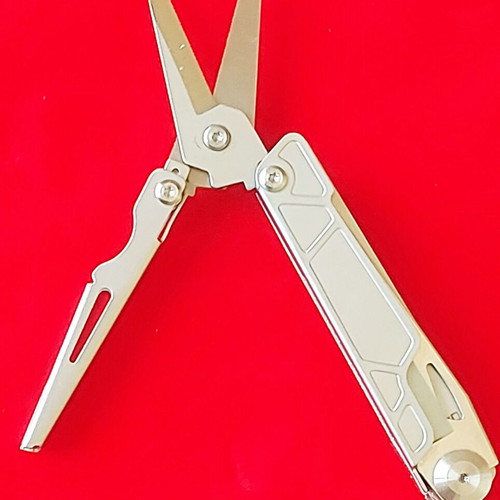 Multitool new with large scissors, knife, and double-tip screwdriver