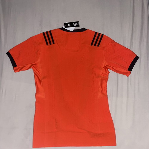 Orange Rugby Jersey new with tags, size 8 medium fit