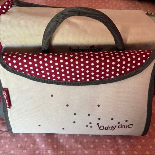 Babymoov Baby Chic changing bag used with accessories