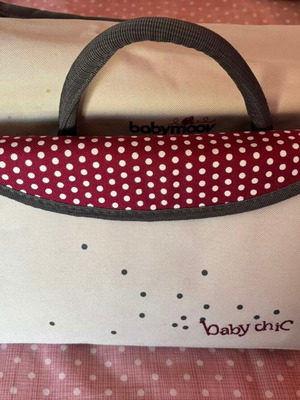 Babymoov Baby Chic changing bag used with accessories