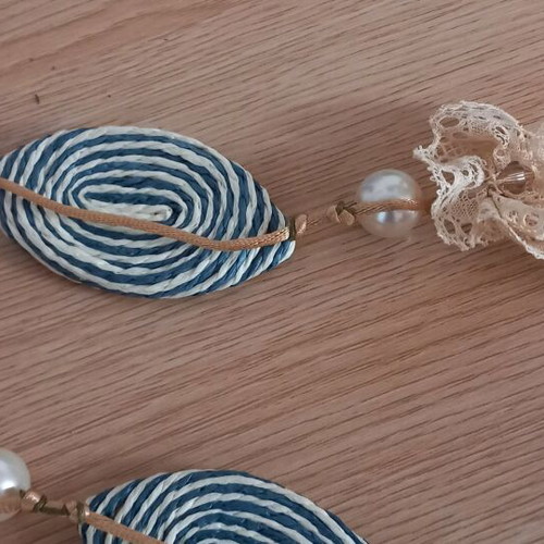 Women's necklace used handmade with pearls and cord