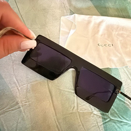 Gucci sunglasses used, black with missing rhinestones