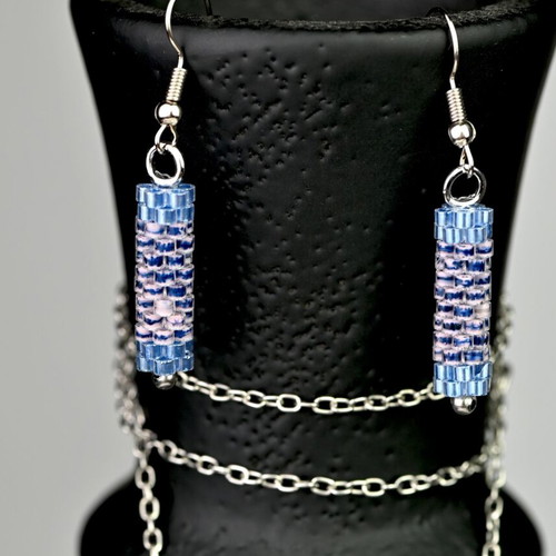 Custom-made jewelry set in light blue tones with hexagonal pendant