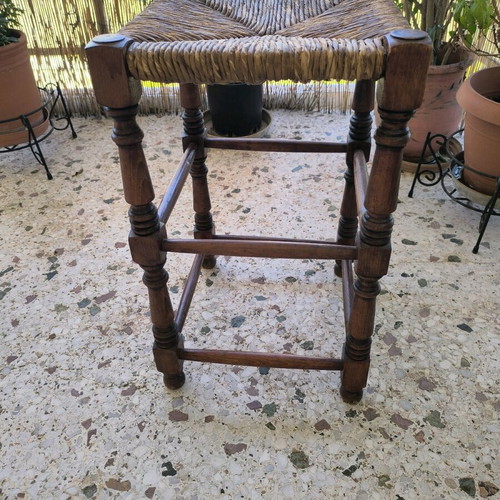 Vintage wicker stool used with wooden frame