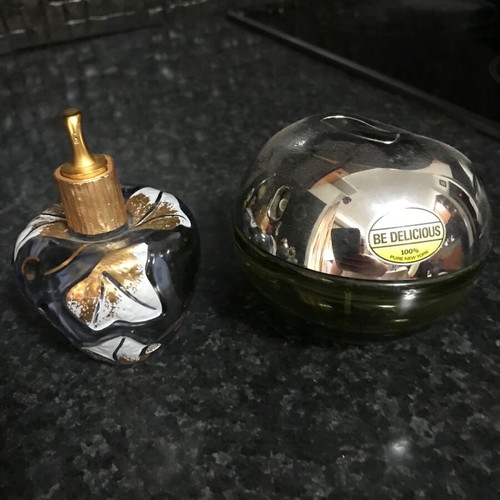 Lolita Lempicka and Donna Karan DKNY Be Delicious empty perfume bottles like new