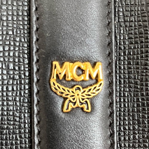 MCM black handbag with gold metal like new