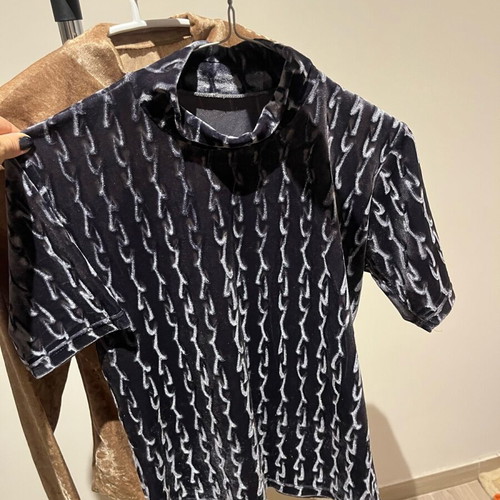 Set of three used velour long and short sleeve shirts