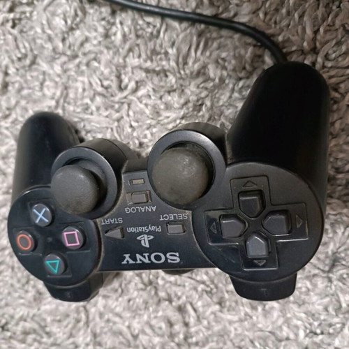 PlayStation 2 controller used, untested