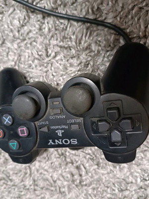 PlayStation 2 controller used, untested