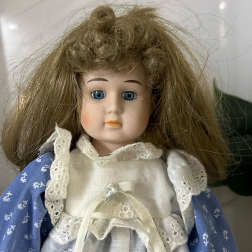 Porcelain doll Germany from the 70s like new