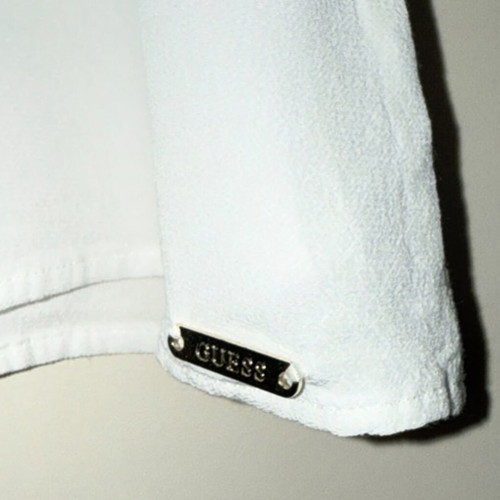 Cropped white sleeveless Guess shirt like new