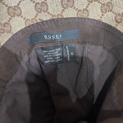 Gucci hat like new with metal details and brown lining