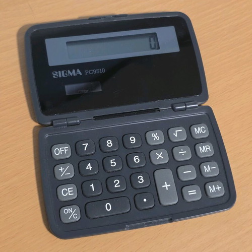 Sigma PC9510 pocket calculator used, foldable with 8-digit display