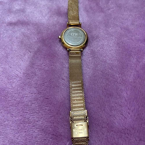 Daniel Wellington women's watch used with gold bracelet