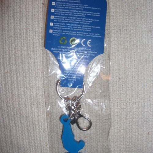 Chiquita Lego Movie 2-2019 Warner Bross keychain new, sealed packaging