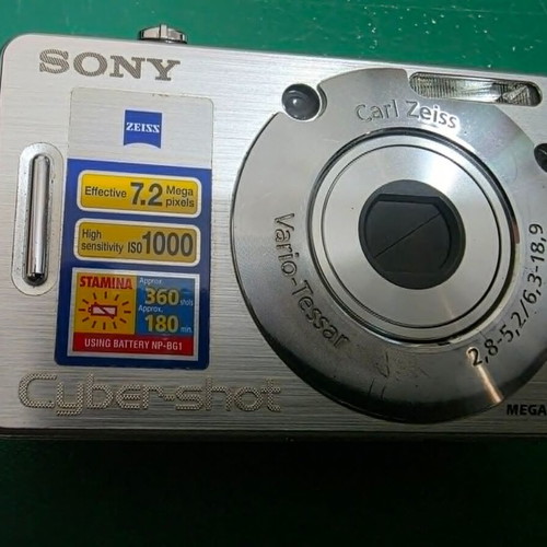 Sony Cyber-shot DSC-W70 digital camera with battery and charger