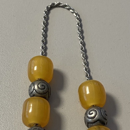 Collectible worry beads with yellow and hammered beads, 23 cm, like new