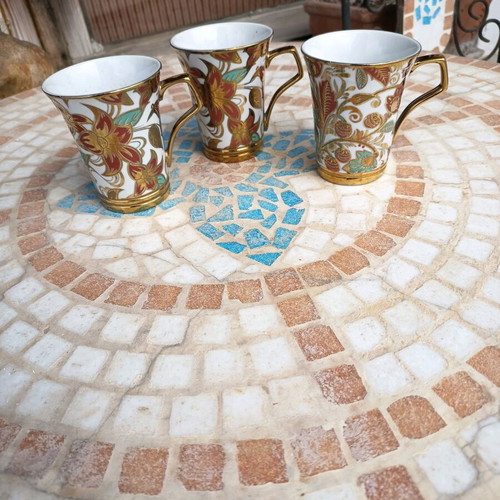 Vintage gold-colored cups used, set of 3