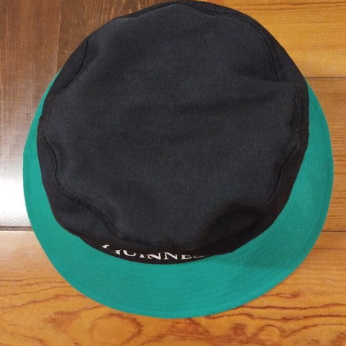 Guinness Bucket Hat new, black with green brim, one size