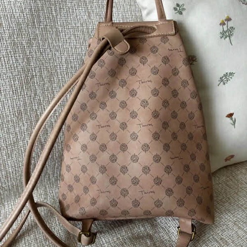 Thiros backpack used, nude with signature design