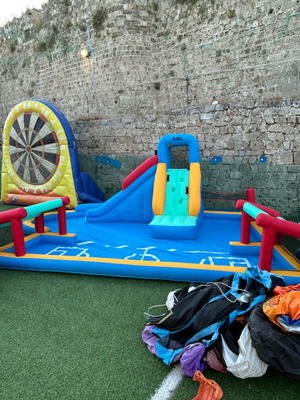 Inflatable toy for children with slide, football and volleyball