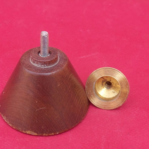 Wooden finial with brass tip